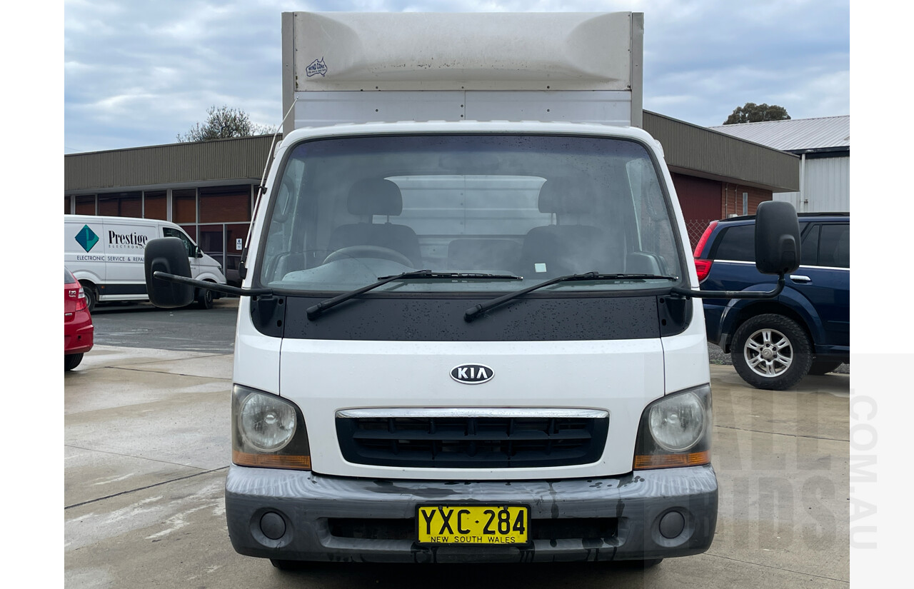 8/2003 Kia K2700 TU Pantech White 2.7L