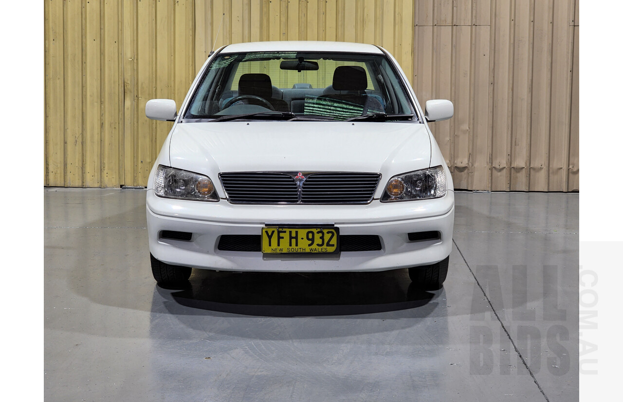 7/2002 Mitsubishi Lancer LS CG 4d Sedan White 2.0L