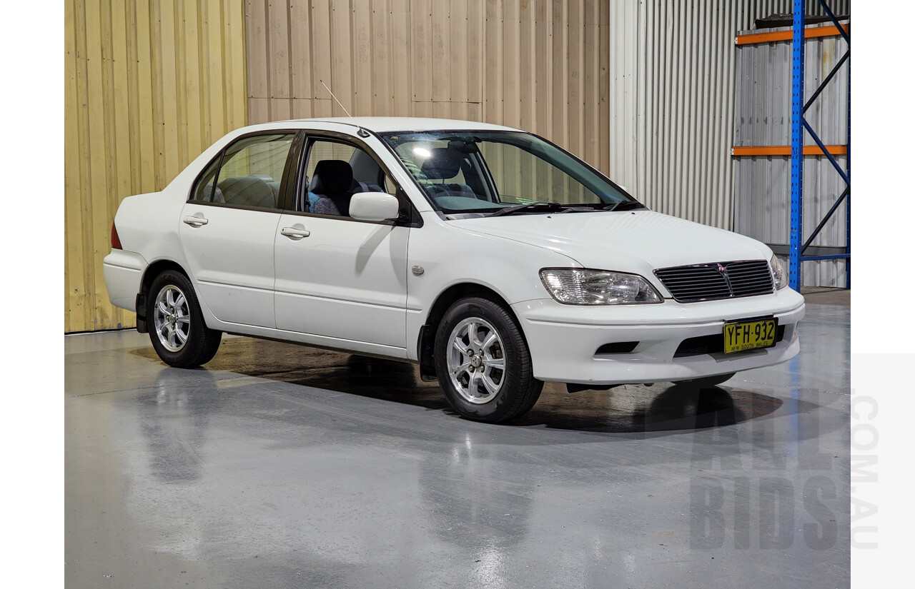 7/2002 Mitsubishi Lancer LS CG 4d Sedan White 2.0L