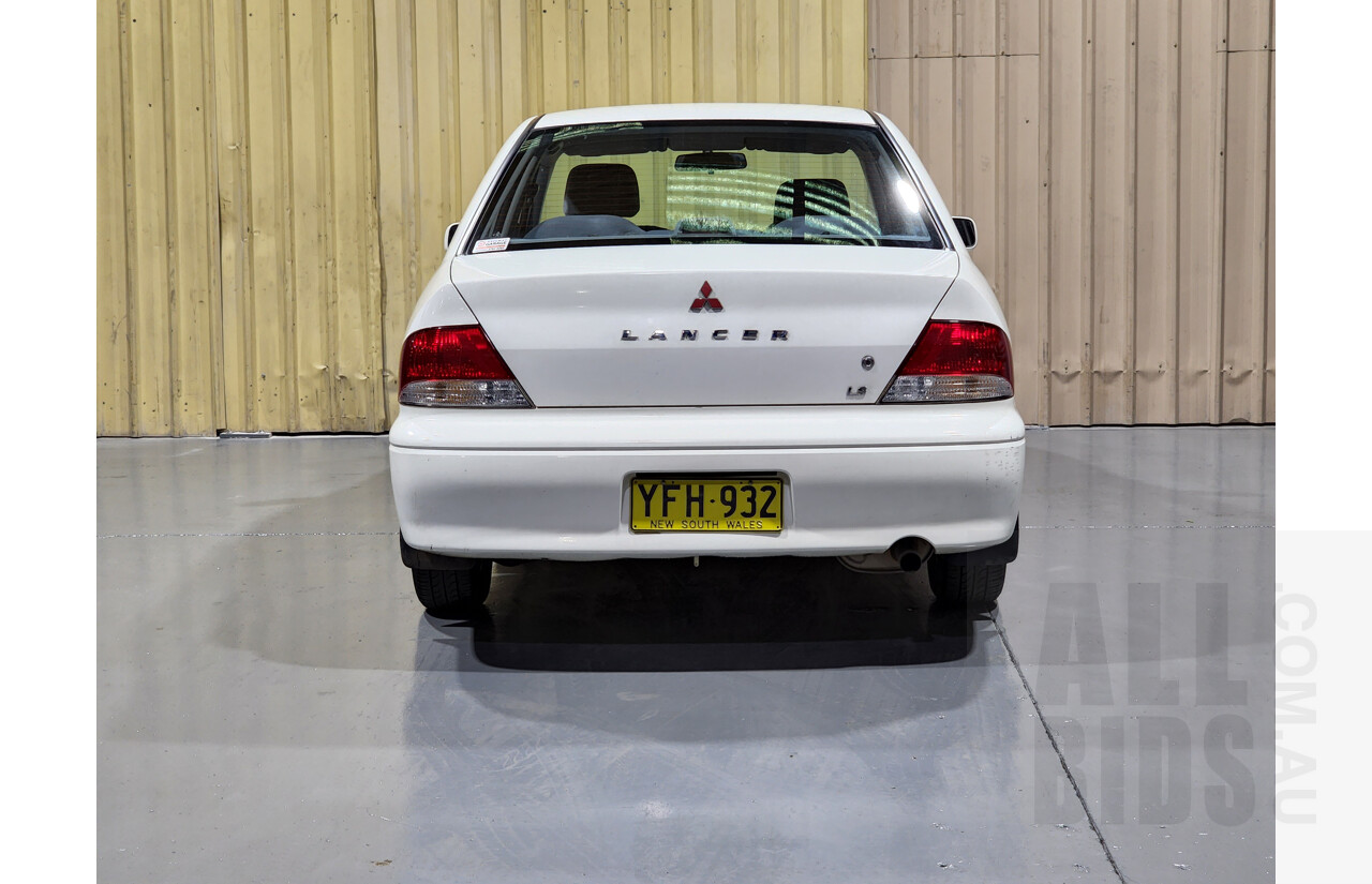 7/2002 Mitsubishi Lancer LS CG 4d Sedan White 2.0L