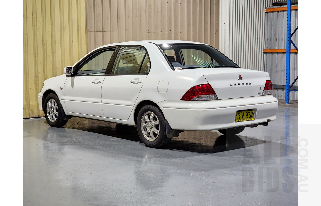 7/2002 Mitsubishi Lancer LS CG 4d Sedan White 2.0L