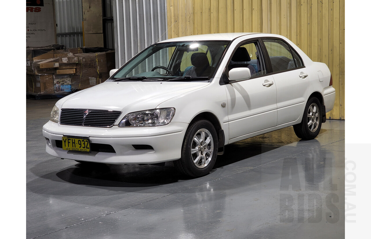 7/2002 Mitsubishi Lancer LS CG 4d Sedan White 2.0L