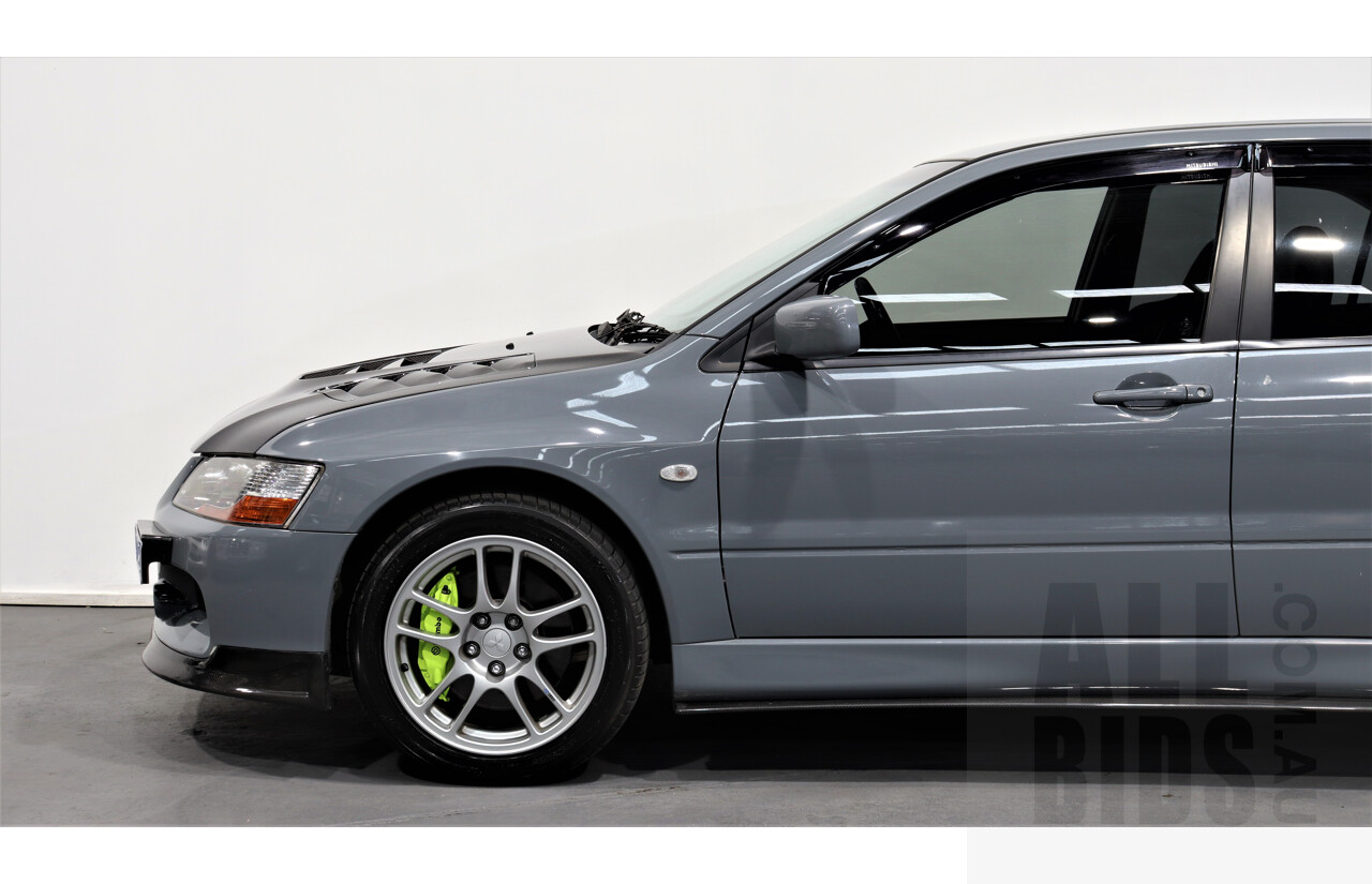 8/2005 Mitsubishi Lancer Evolution IX CY 4d Sedan Wrapped Dark Grey, White underneath 2.0L Turbo