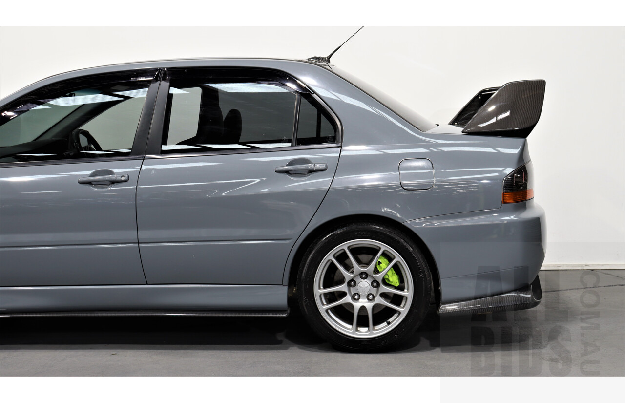 8/2005 Mitsubishi Lancer Evolution IX CY 4d Sedan Wrapped Dark Grey, White underneath 2.0L Turbo