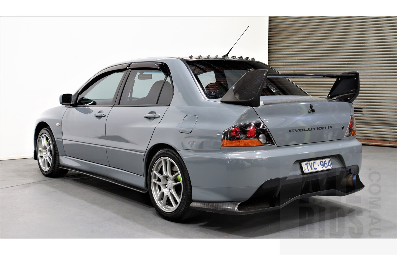 8/2005 Mitsubishi Lancer Evolution IX CY 4d Sedan Wrapped Dark Grey, White underneath 2.0L Turbo