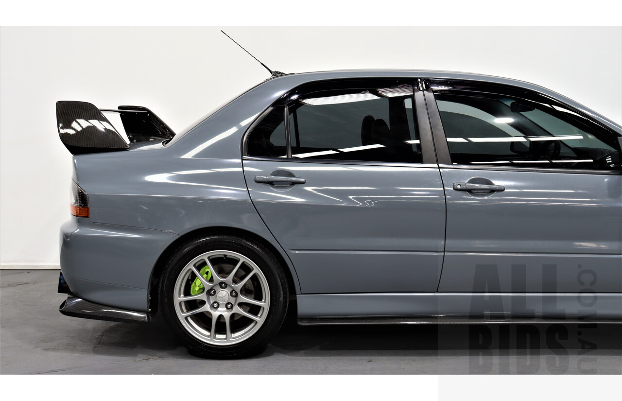 8/2005 Mitsubishi Lancer Evolution IX CY 4d Sedan Wrapped Dark Grey, White underneath 2.0L Turbo