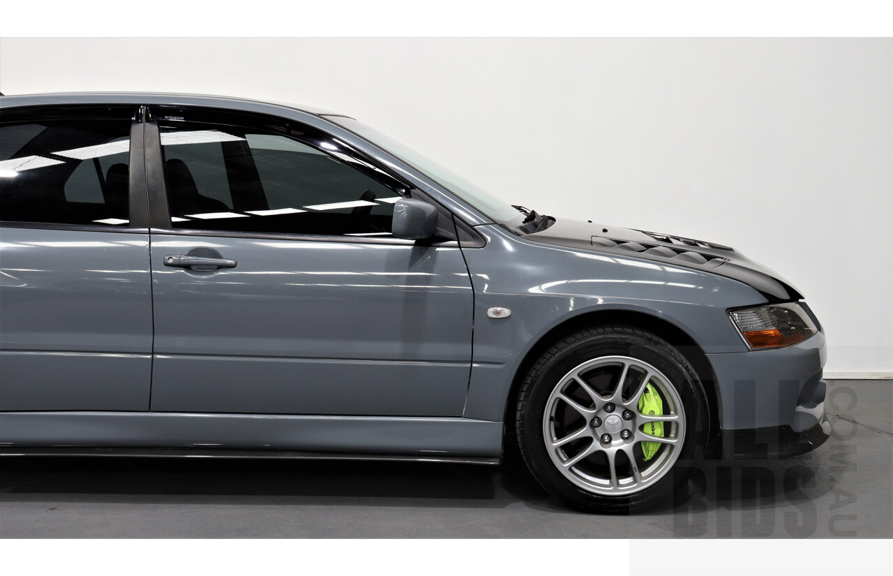 8/2005 Mitsubishi Lancer Evolution IX CY 4d Sedan Wrapped Dark Grey, White underneath 2.0L Turbo