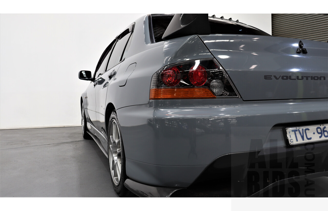 8/2005 Mitsubishi Lancer Evolution IX CY 4d Sedan Wrapped Dark Grey, White underneath 2.0L Turbo