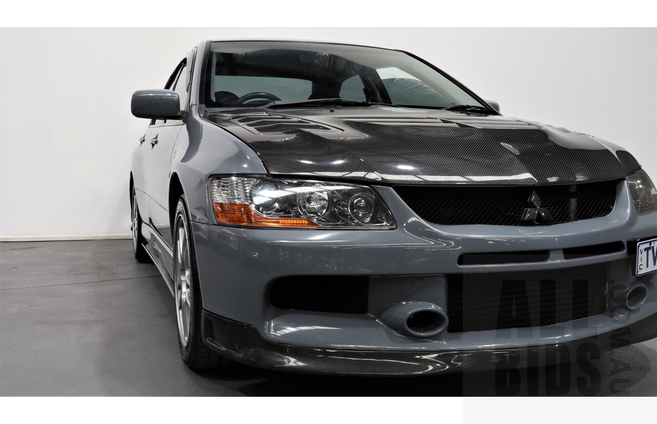 8/2005 Mitsubishi Lancer Evolution IX CY 4d Sedan Wrapped Dark Grey, White underneath 2.0L Turbo