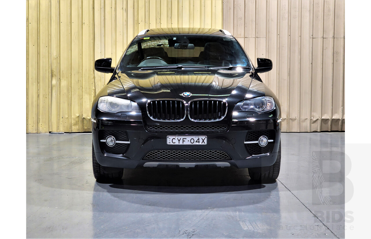 7/2009 BMW X6 Xdrive 35i E71 4d Coupe Black 3.0L Turbo Petrol
