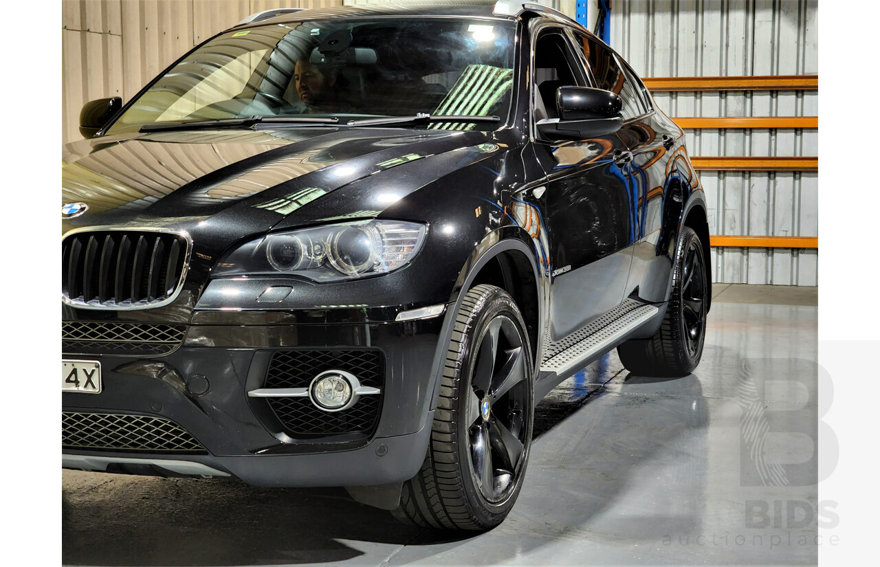 7/2009 BMW X6 Xdrive 35i E71 4d Coupe Black 3.0L Turbo Petrol