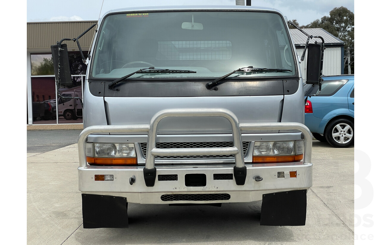 6/2004 Mitsubishi Canter FE649 MWB C/Chas Silver 3.9L