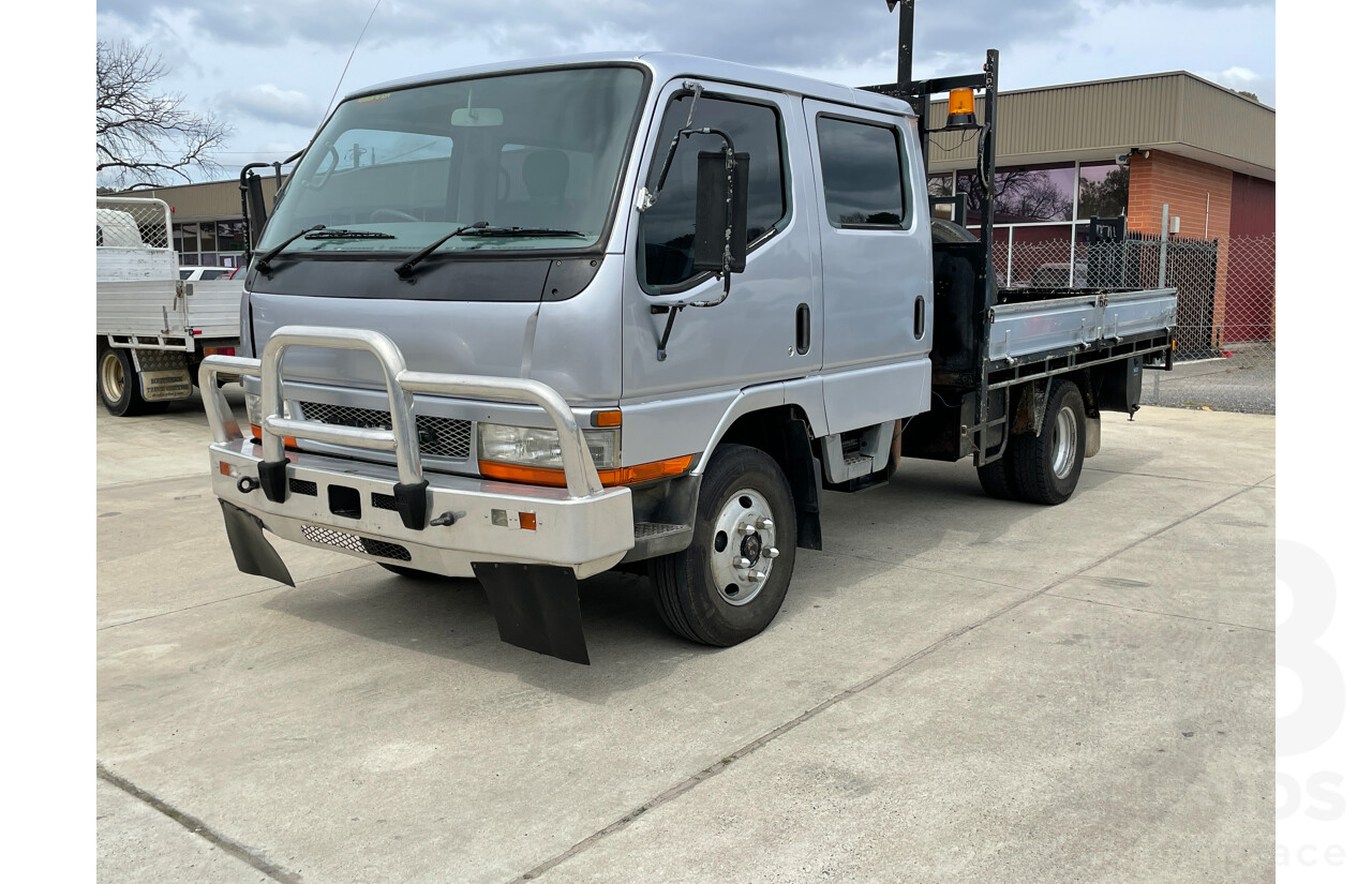 6/2004 Mitsubishi Canter FE649 MWB C/Chas Silver 3.9L