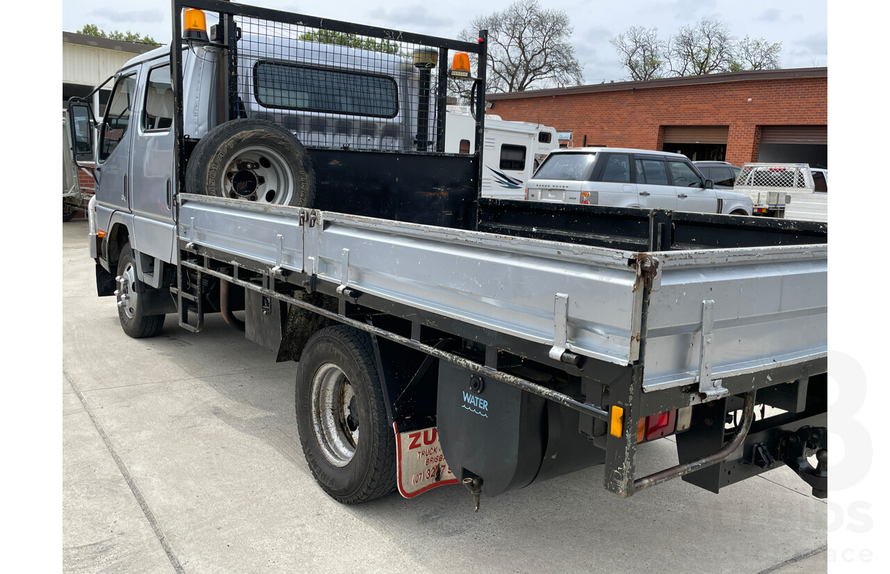 6/2004 Mitsubishi Canter FE649 MWB C/Chas Silver 3.9L