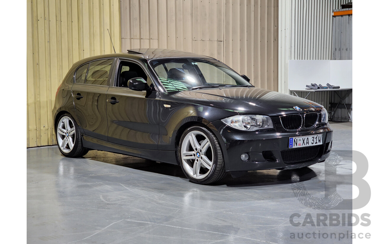 9/2010 BMW 118d E87 MY09 5d Hatchback Black 2.0L Turbo Diesel