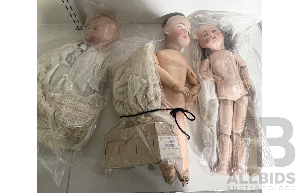 Three German Antique Porcelain Composite Dolls Including Clothes