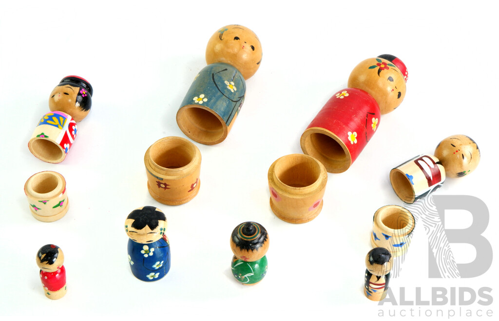Collection of Nesting Vintage Painted Japanese Kokeshi Dolls Includes Eight Dolls in Total