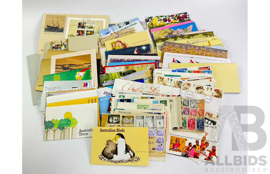 Collection of 1980's Australian Stamp Packs with United Kingdom First Day Covers