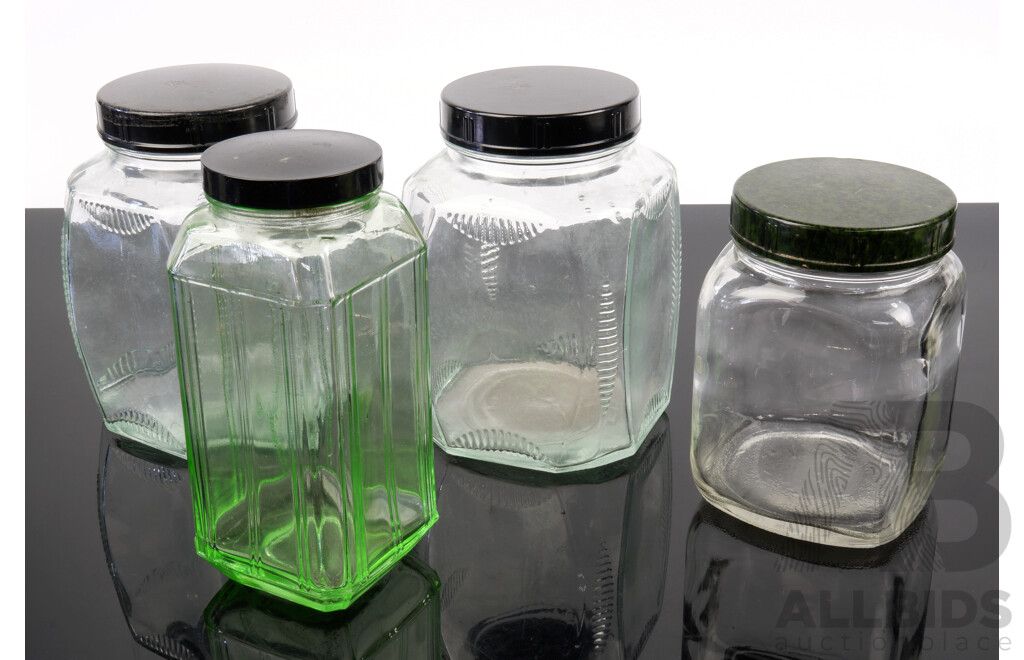 Collection Four Antique Jars with Bakelite Lids Including Matching Pair and Uranium Glass Example