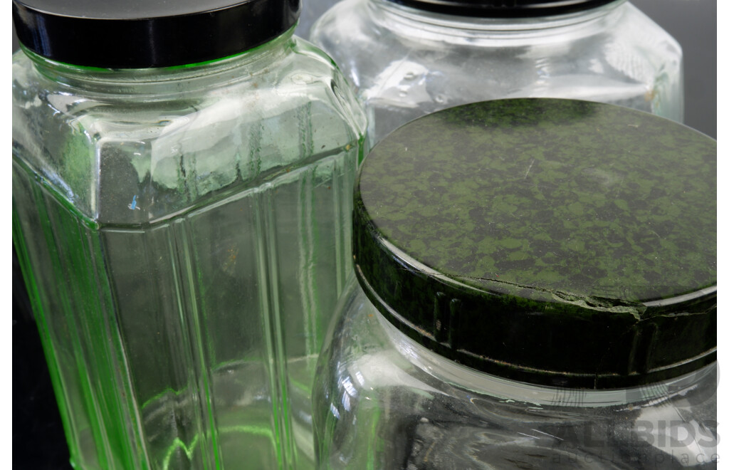 Collection Four Antique Jars with Bakelite Lids Including Matching Pair and Uranium Glass Example