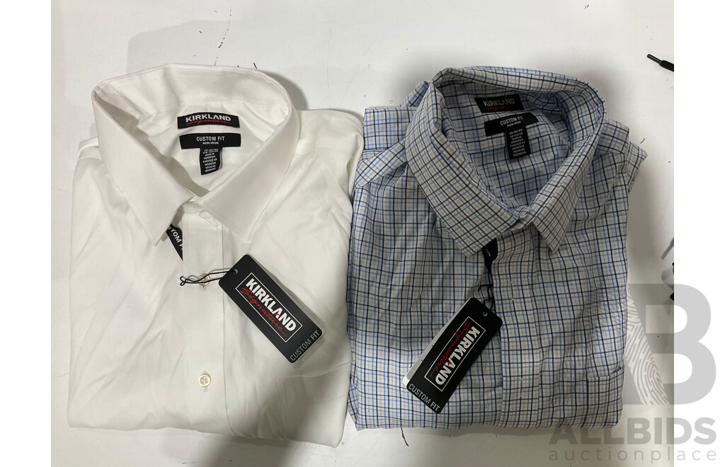 TOMMY HILIFIGER, NEW BALANCE, KIRKLAND, BEN SHERMAN, PUMA - Assorted Men's Clothing Size XL and XXL - Lot of 10 - Estimated ORP $500