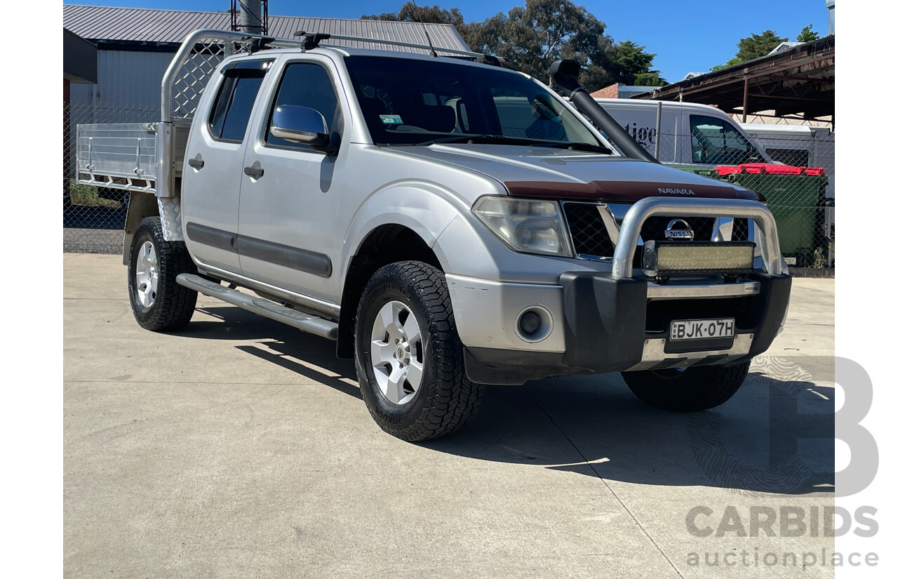 3/2009 Nissan Navara ST-X (4x4) D40 Dual Cab Ute Silver 2.5L