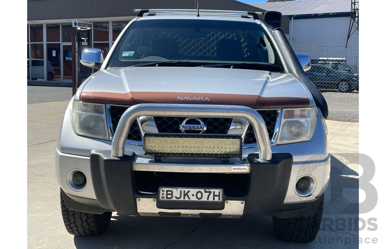 3/2009 Nissan Navara ST-X (4x4) D40 Dual Cab Ute Silver 2.5L