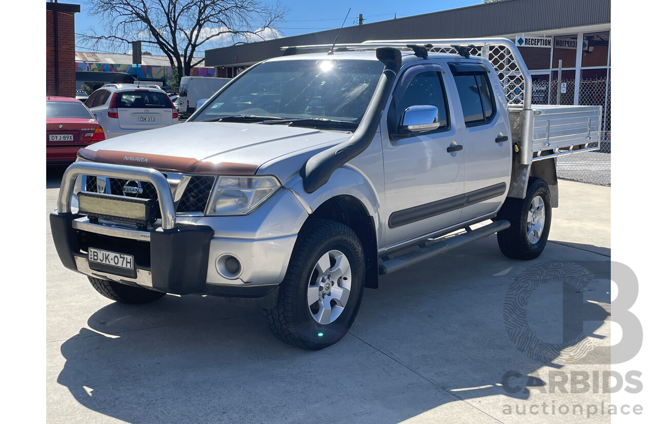 3/2009 Nissan Navara ST-X (4x4) D40 Dual Cab Ute Silver 2.5L