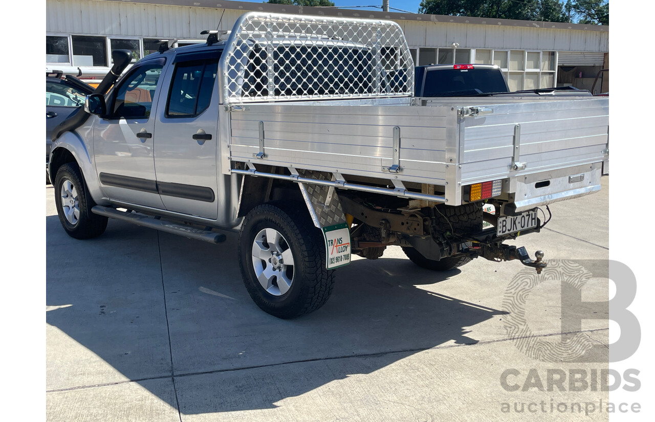 3/2009 Nissan Navara ST-X (4x4) D40 Dual Cab Ute Silver 2.5L