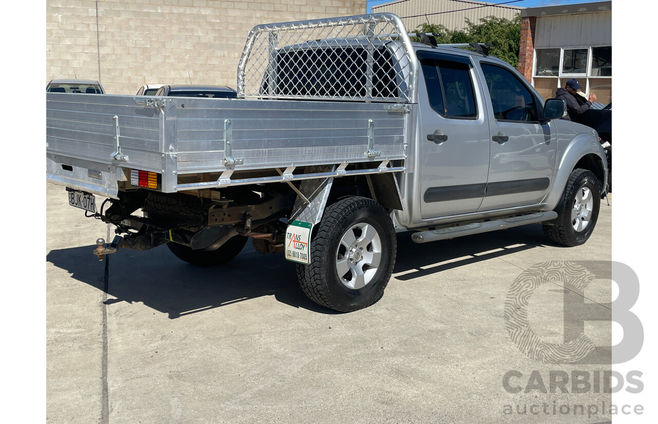 3/2009 Nissan Navara ST-X (4x4) D40 Dual Cab Ute Silver 2.5L