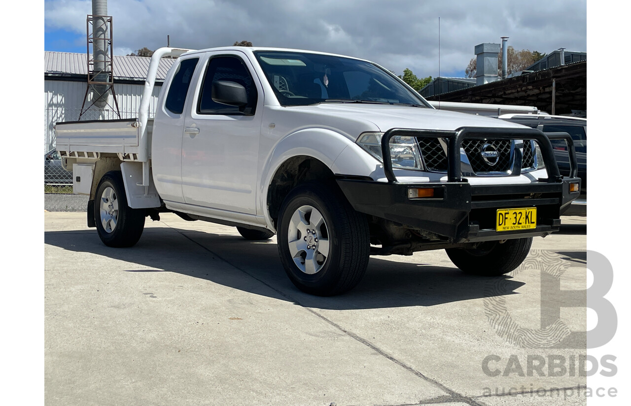 2/2010 Nissan Navara RX (4x4) D40 King C/Chas White 2.5L