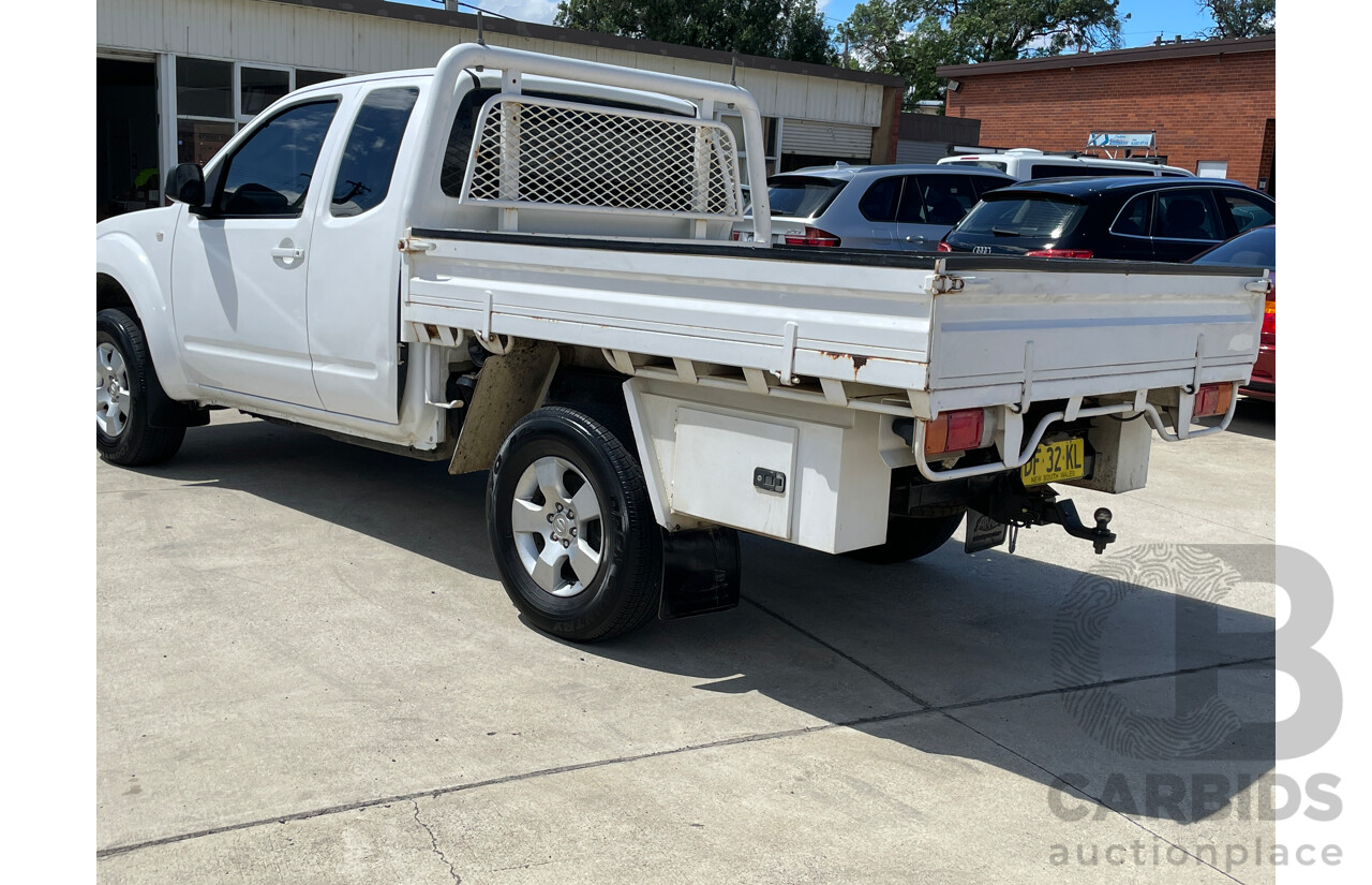 2/2010 Nissan Navara RX (4x4) D40 King C/Chas White 2.5L