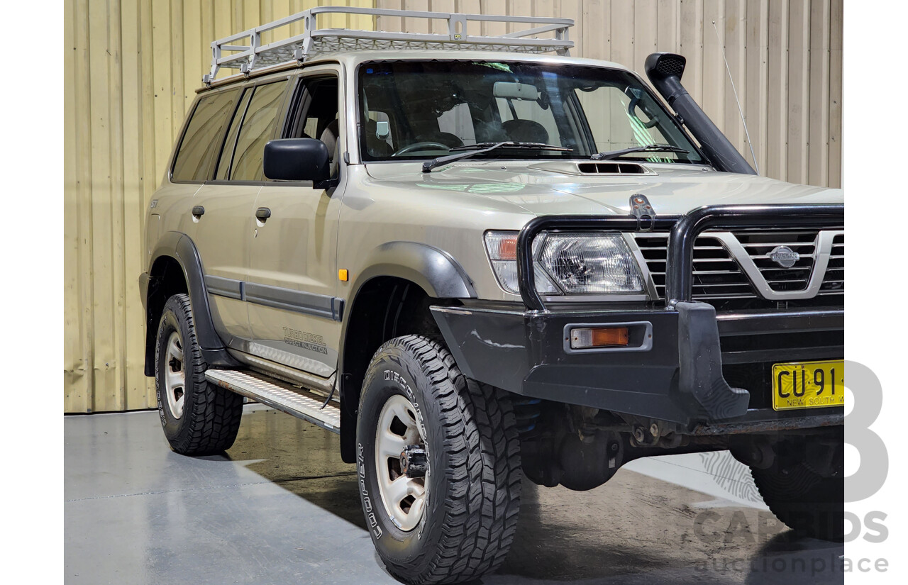 7/2001 Nissan Patrol ST (4x4) GU II 4d Wagon Gold 3.0L Turbo Diesel - 7 Seater