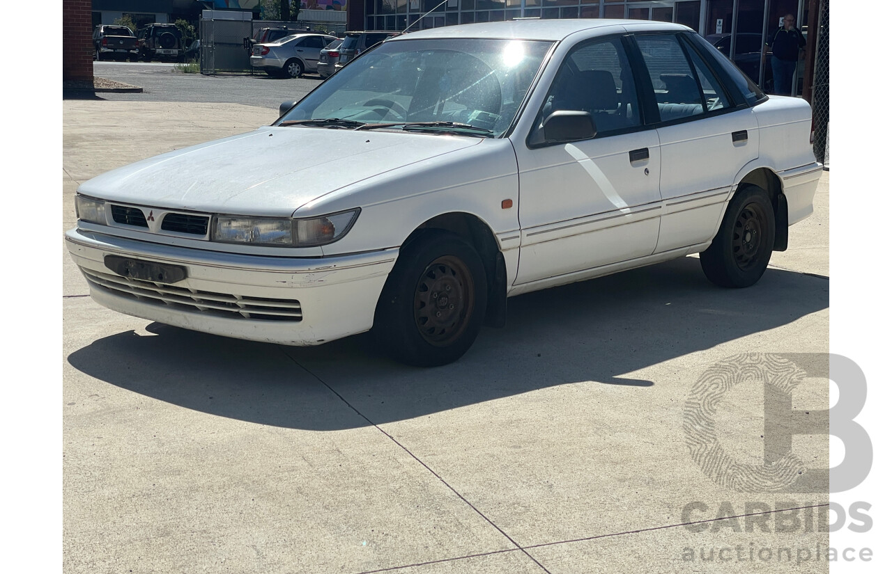 9/1993 Mitsubishi Lancer GLXi CC 5d Hatchback White 1.6L