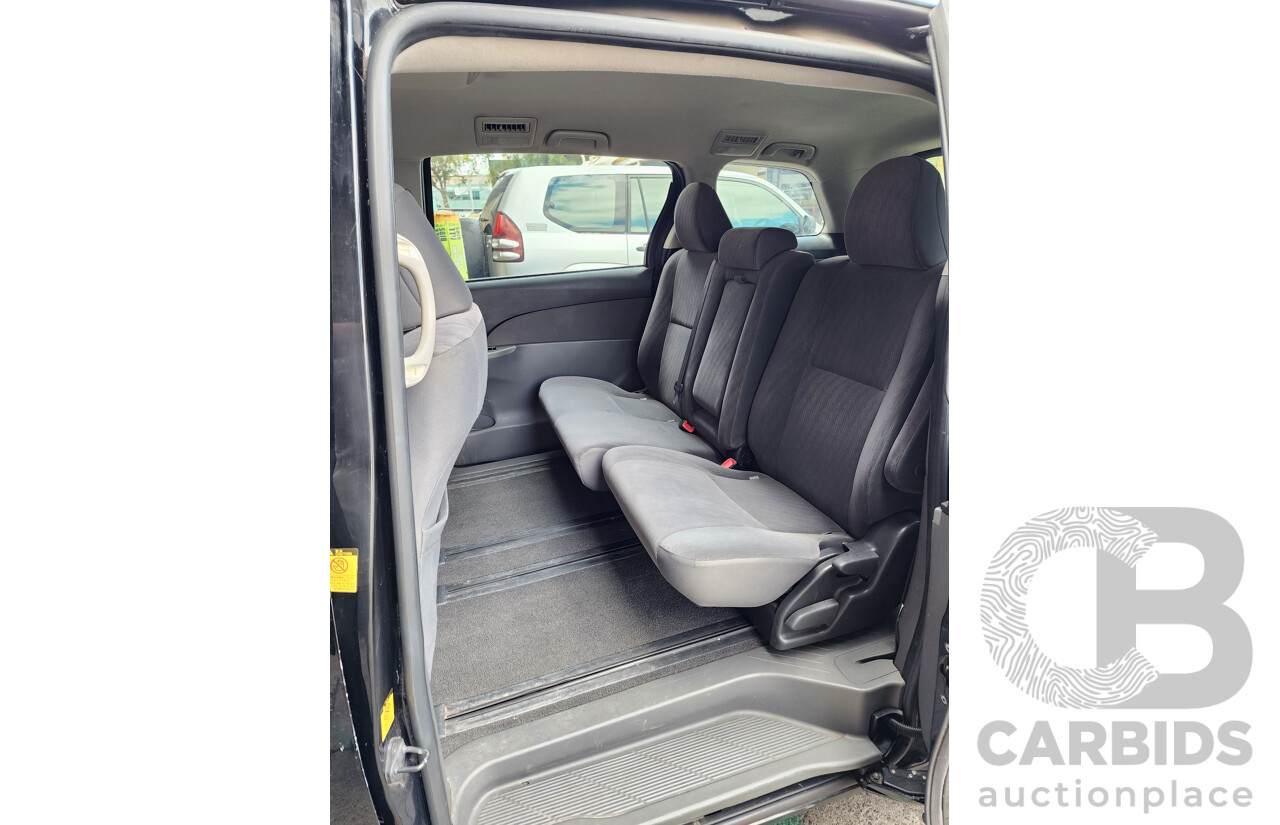 12/2011 Toyota Tarago GLi ACR50R 4d Wagon Black 2.4L - 8 Seater