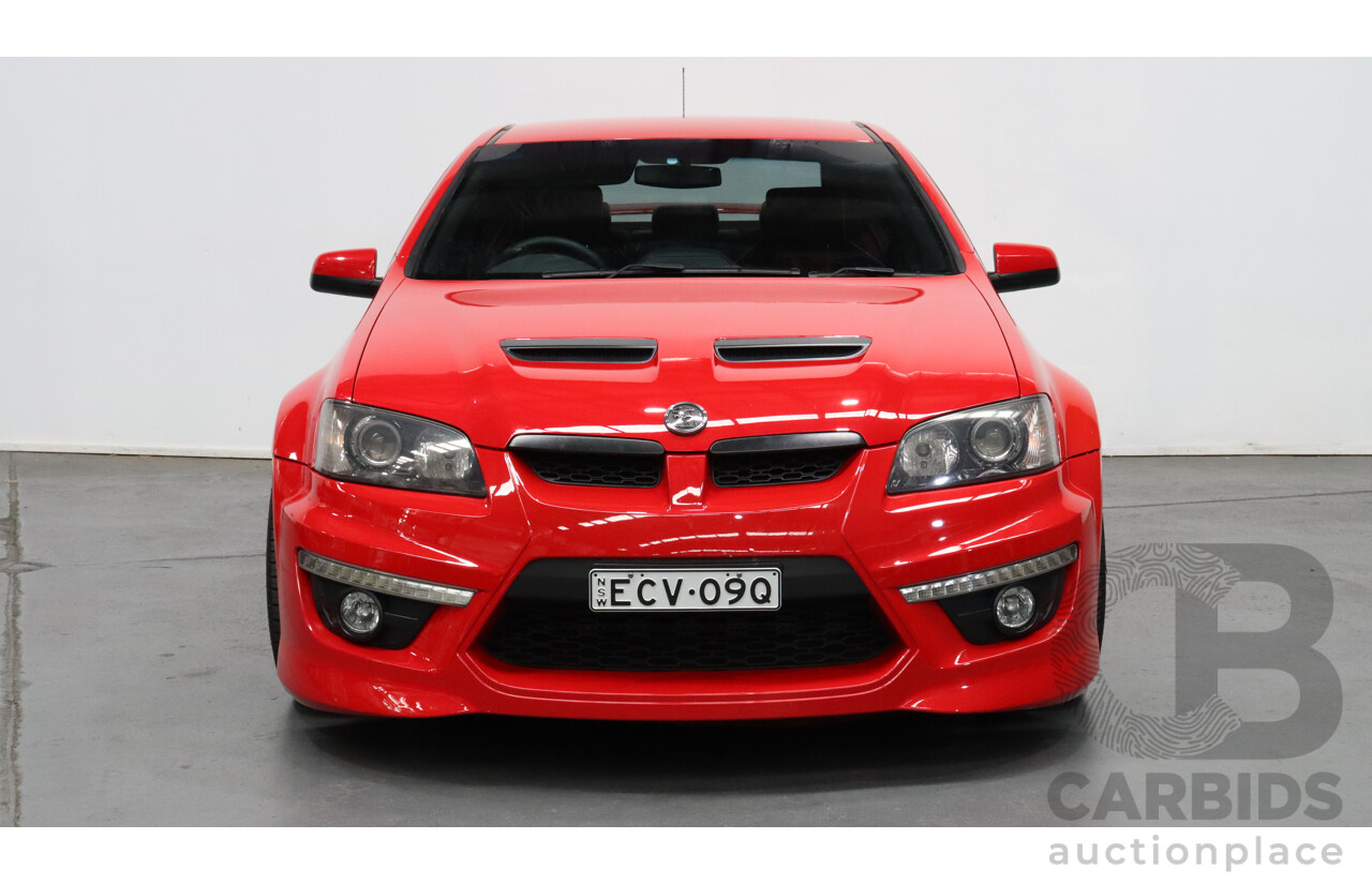 2/2011 Holden HSV Clubsport R8 E3 4d Sedan Red 6.2L V8