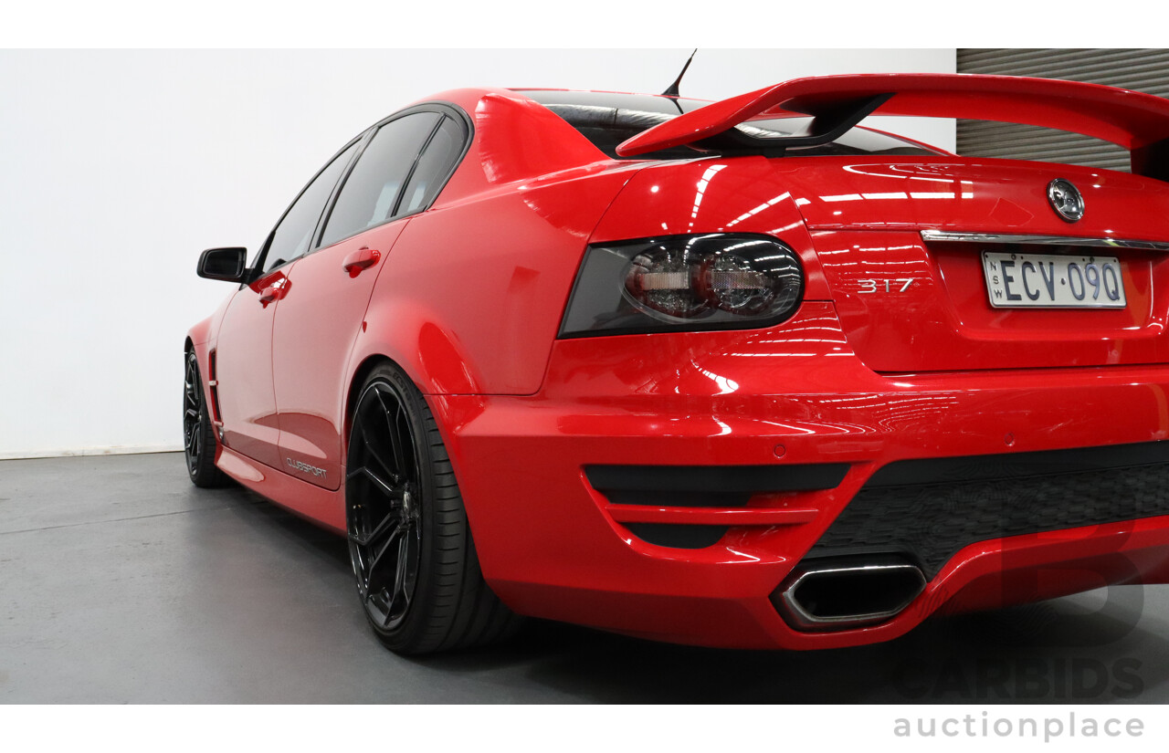 2/2011 Holden HSV Clubsport R8 E3 4d Sedan Red 6.2L V8