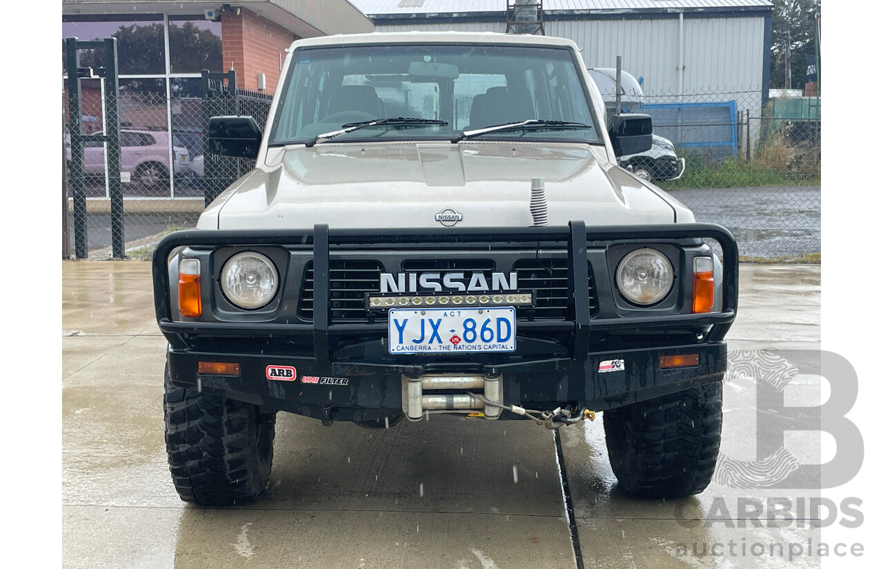 8/1992 Nissan Patrol ST (4x4) GQ 4d Wagon Gold / Green 4.2L