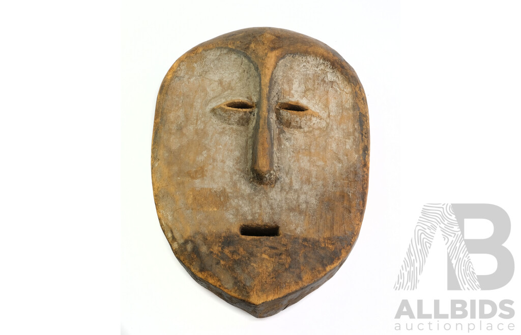 African Congolese Carved Wood and Kaolin Stained 'Lega' Mask, Height 29cm
