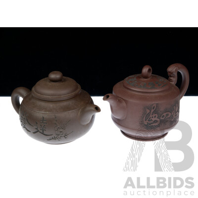 Two Vintage Chinese Yi Xing Lidded Teapots Including Eagle Decorated Example