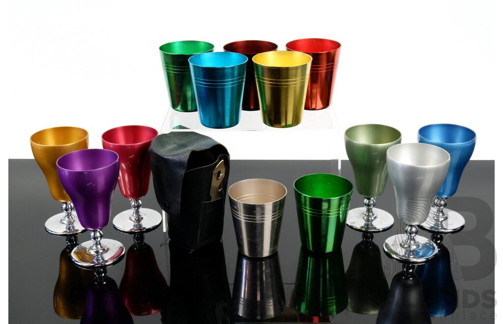 Seven Australian Anodised Tin Travelling Cups with Six Carrington Anodised Tin Wine Glasses