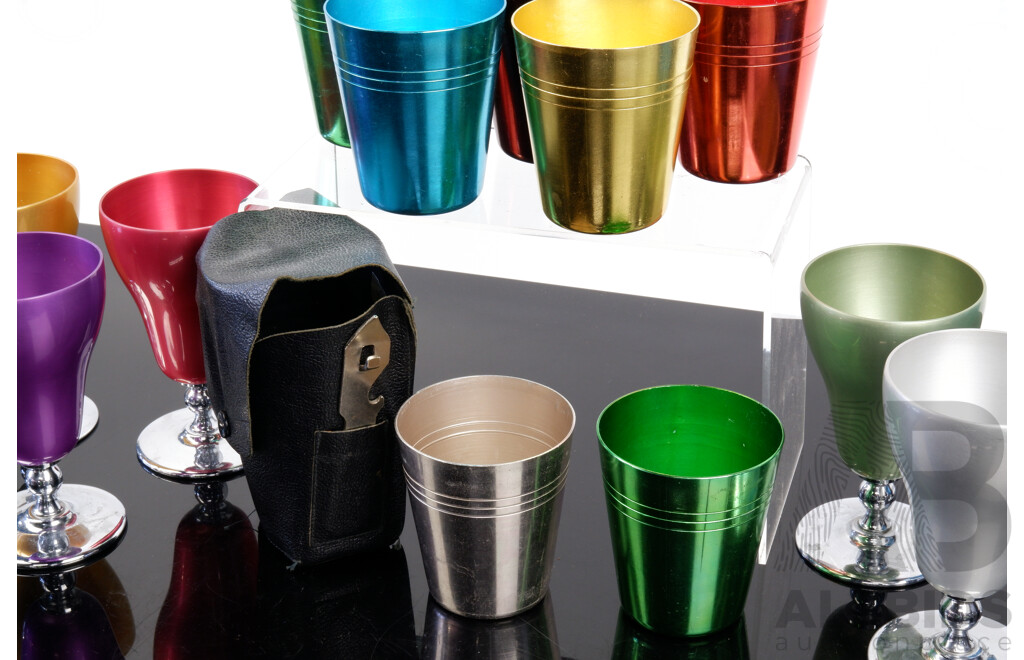 Seven Australian Anodised Tin Travelling Cups with Six Carrington Anodised Tin Wine Glasses
