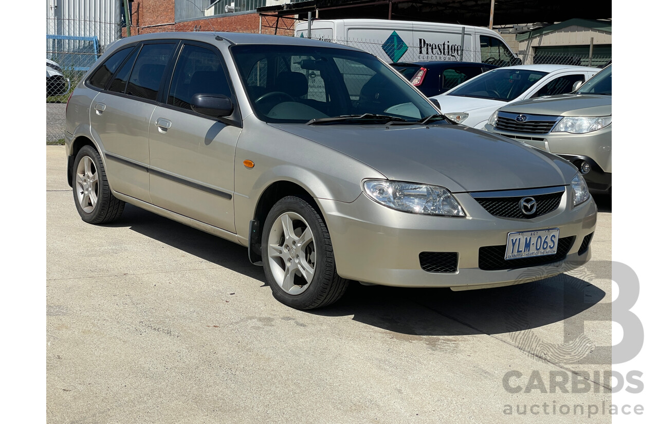 10/2003 Mazda 323 Astina Shades BJ 5d Hatchback Gold 1.8L