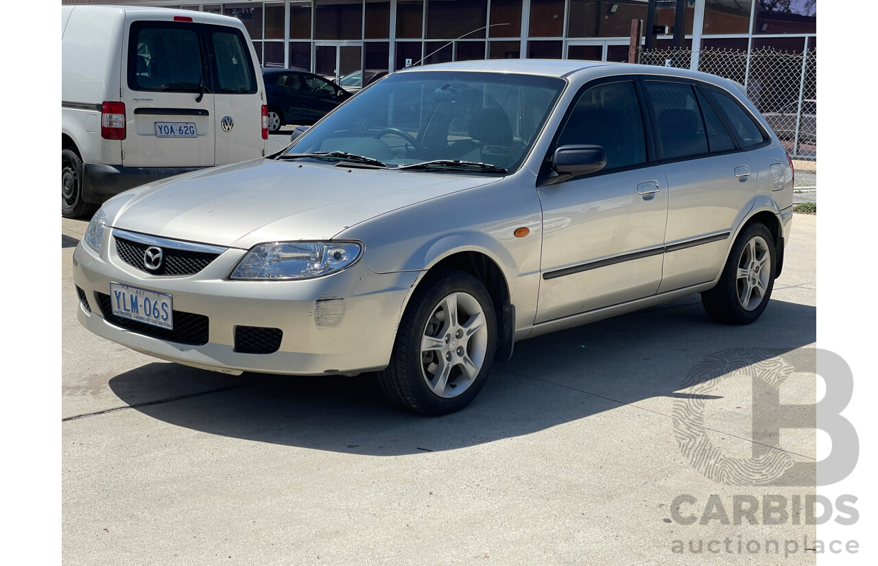 10/2003 Mazda 323 Astina Shades BJ 5d Hatchback Gold 1.8L