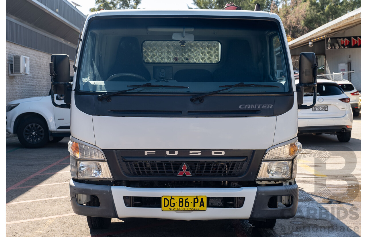 12/2007 Mitsubishi Canter Fuso 7/800 Tipper Truck with HIAB 2d White 3.9L Turbo Diesel