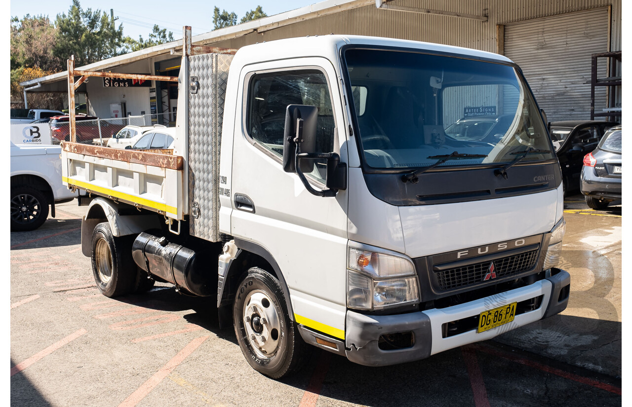 12/2007 Mitsubishi Canter Fuso 7/800 Tipper Truck with HIAB 2d White 3.9L Turbo Diesel