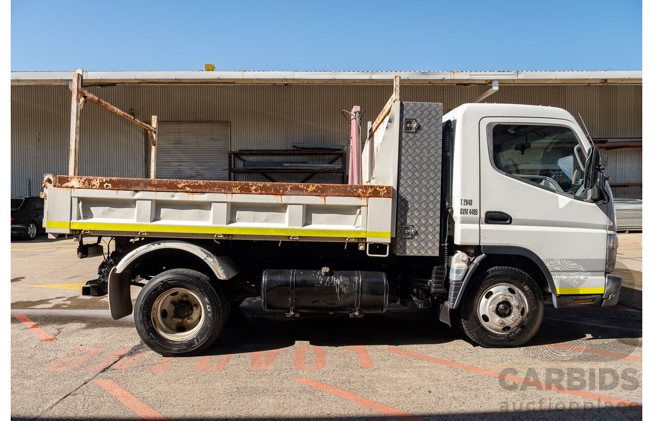 12/2007 Mitsubishi Canter Fuso 7/800 Tipper Truck with HIAB 2d White 3.9L Turbo Diesel