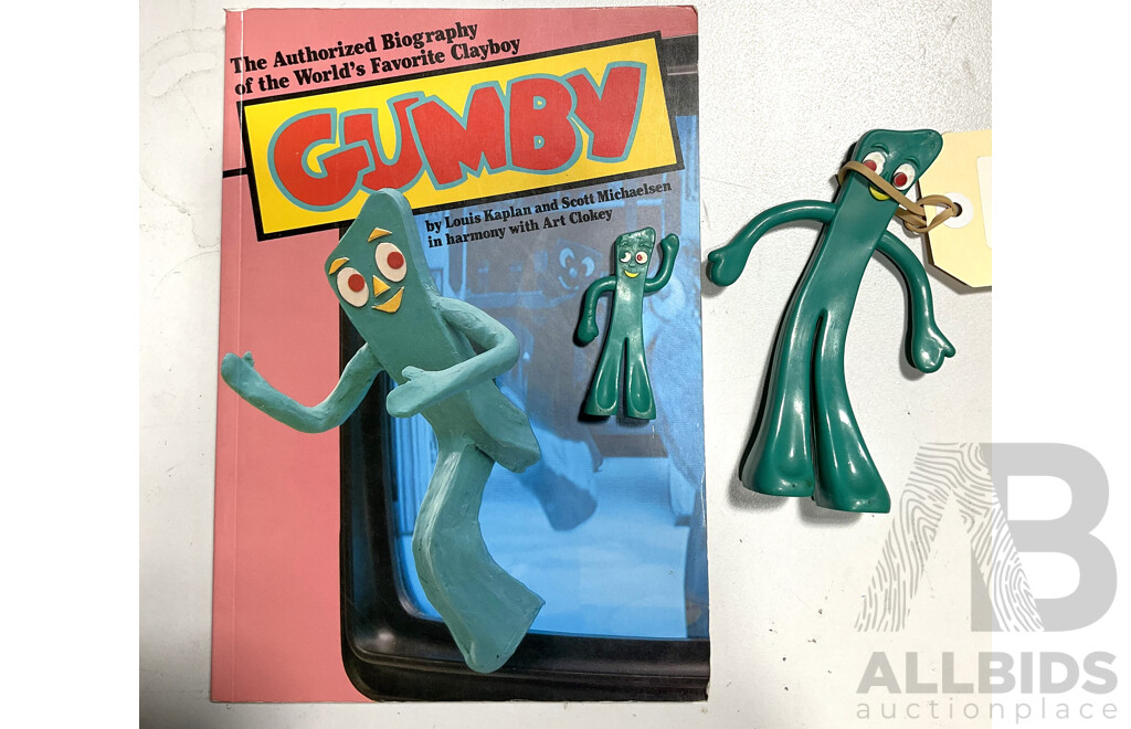 The Authorized Biography of the World’s Favourite Clayboy Gumby, Alongside Two Gumby Figurines