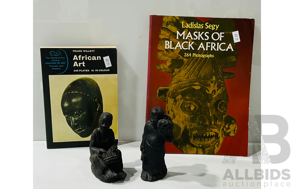 Pair of African Figurines Alongside Two Vintage Books - Masks of Black Africa by Ladislas Segy and African Art by Frank Willett