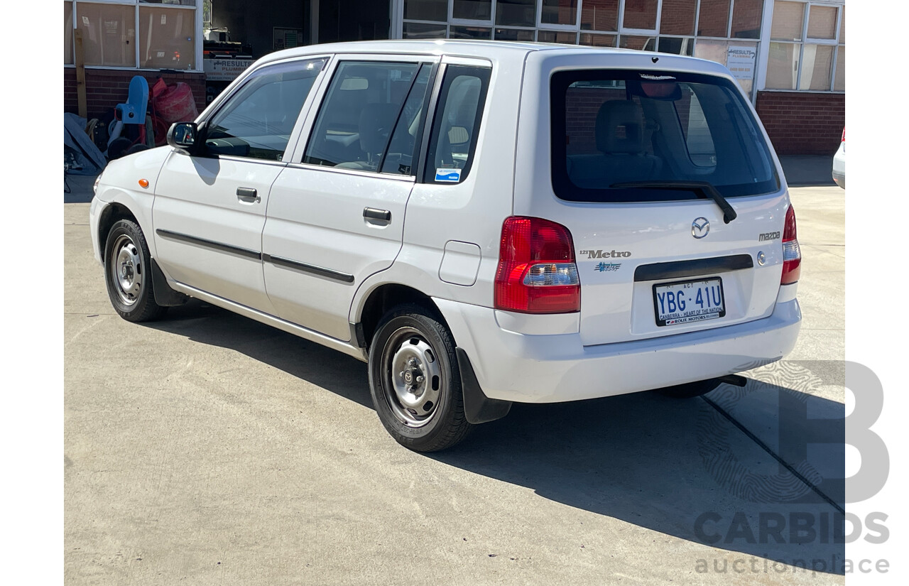 11/2000 Mazda 121 Metro Shades  5d Hatchback White 1.3L